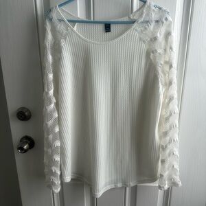 White top with see through long sleeves